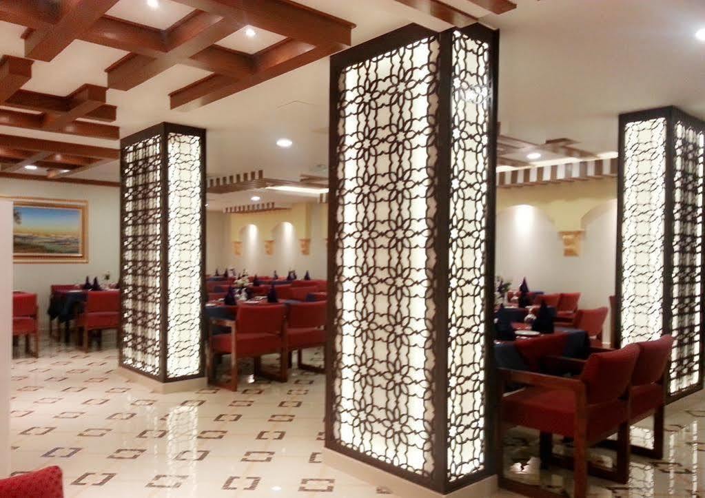 أجنحة المناف هالفندقية مسقط المظهر الخارجي الصورة